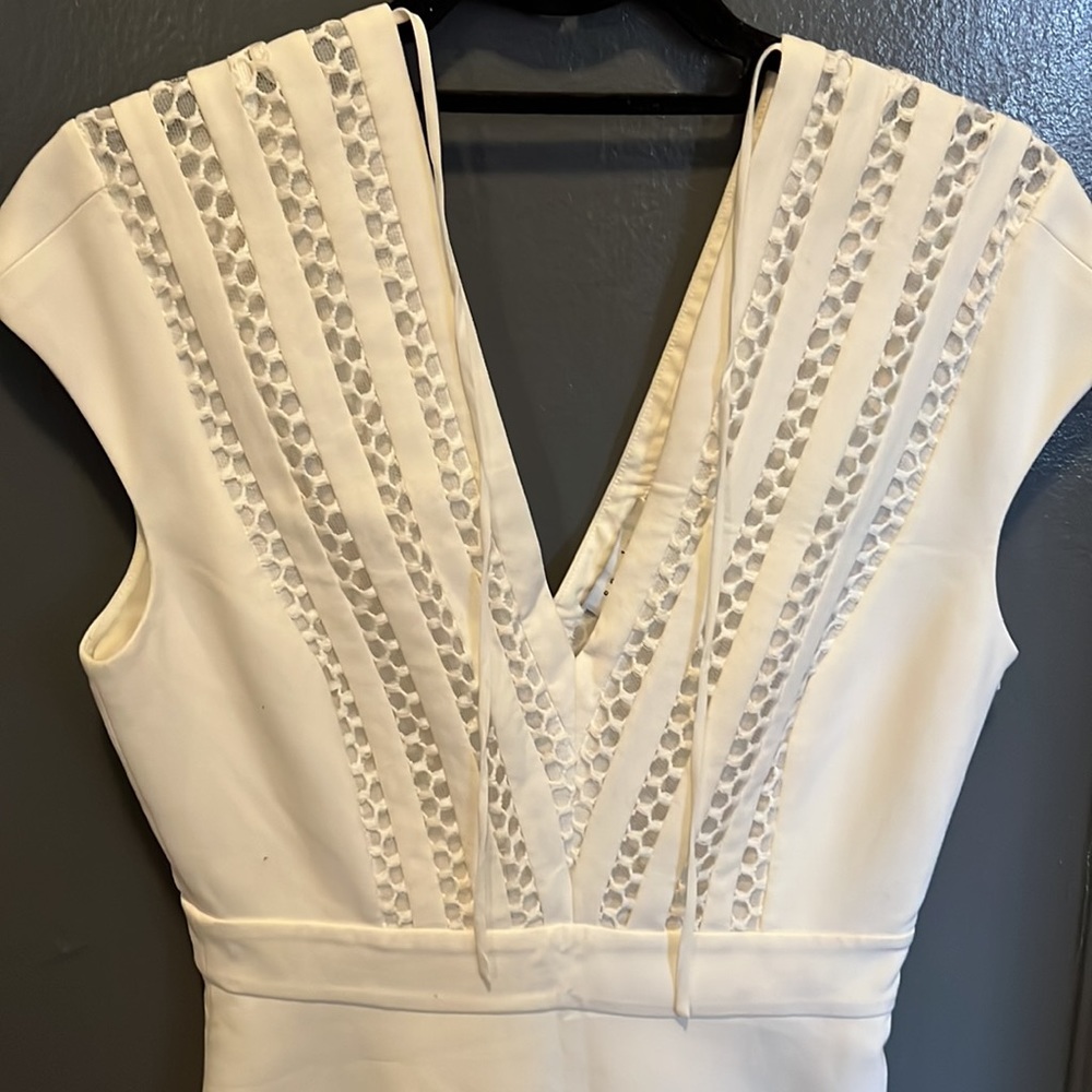 White eyelet Sandro dress. Lined through body. Worn once